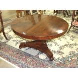 A 19th century figured mahogany circular-top breakfast table on hexagonal column and triform