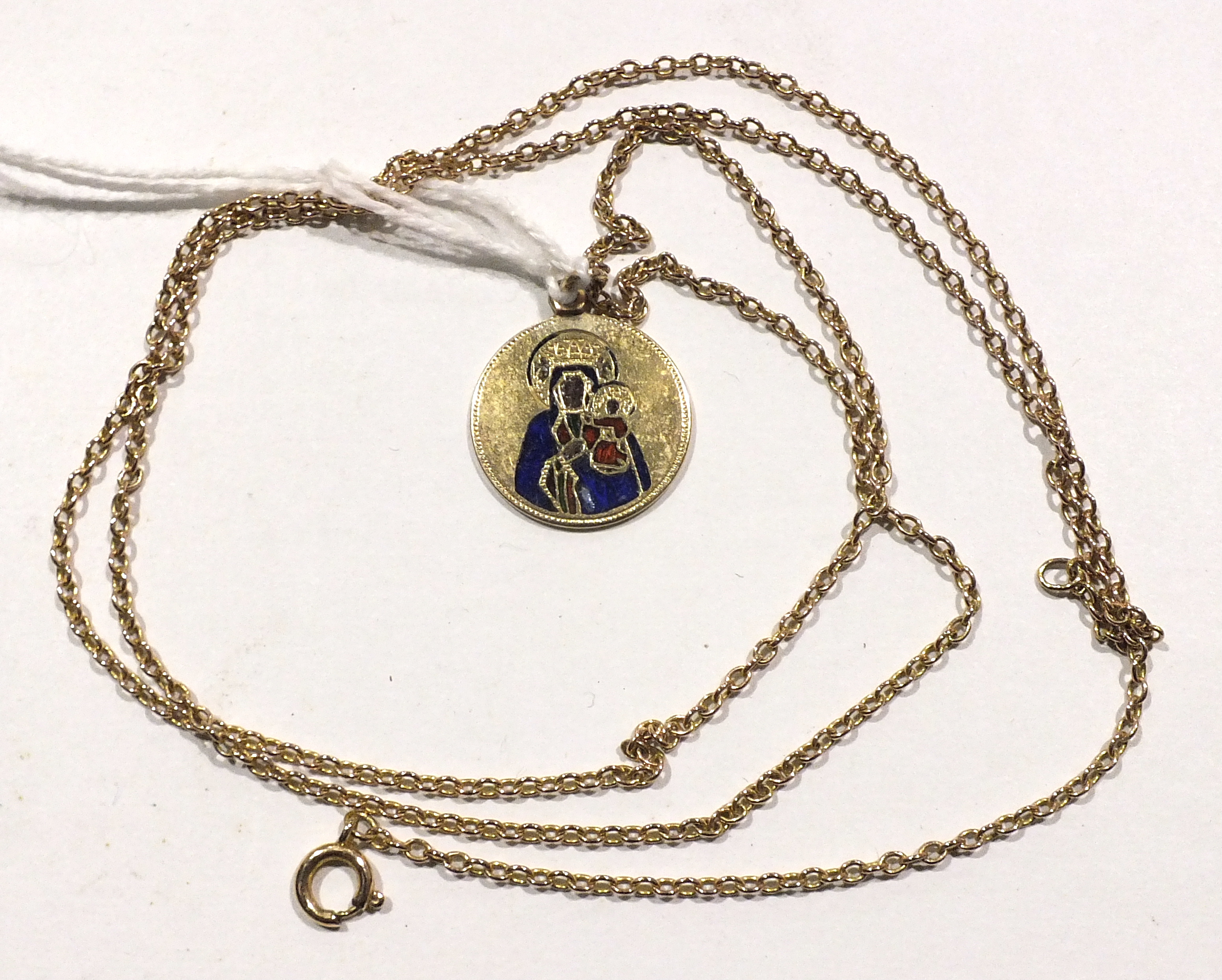 An unmarked gold and enamel Madonna and child pendant on chain, 6.6g.