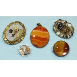 A Victorian hardstone-set brooch and four other agate-set brooches/pendants, (5).