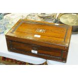 A 19th century rosewood writing slope, the lid with mother-of-pearl decoration, 40cm wide, 14cm
