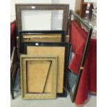 A quantity of various pictures and photograph frames.