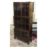 A stained mahogany Globe Wernicke-style three-tier bookcase fitted with three pairs of doors, 88cm