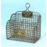 A brass mesh 'Letters Out/In' rack and a table-top miniature cheval mirror with metal support, on