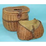 A small wicker pot-bellied creel with leather-bound canvas pocket, 36cm wide, 23cm high and a larger