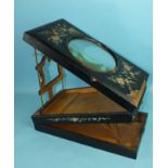 A 19th century ebonised postcard magnifying viewer, 46 x 26cm, (damaged).