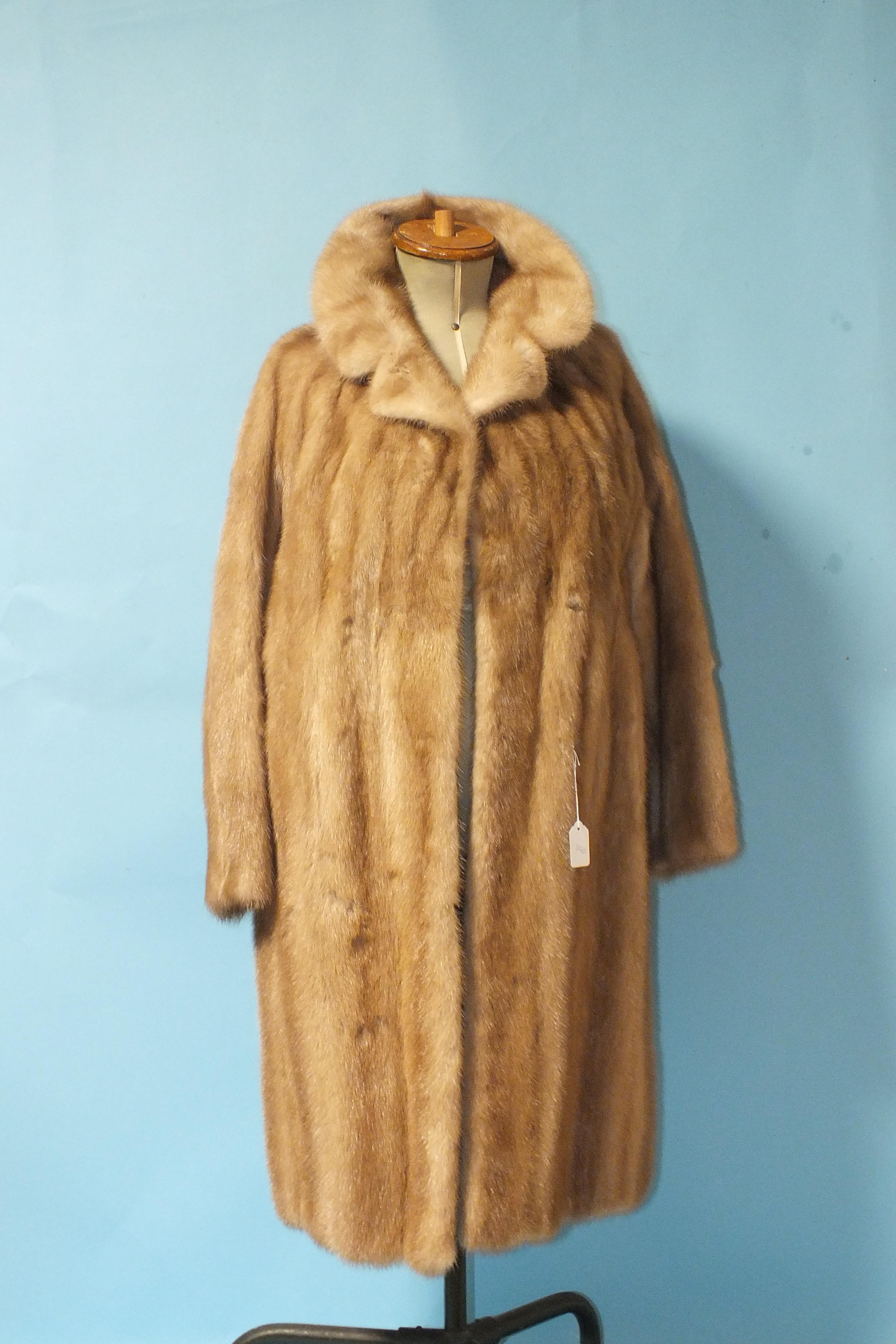 A blonde mink coat, full-length, size 14, no furrier's label.
