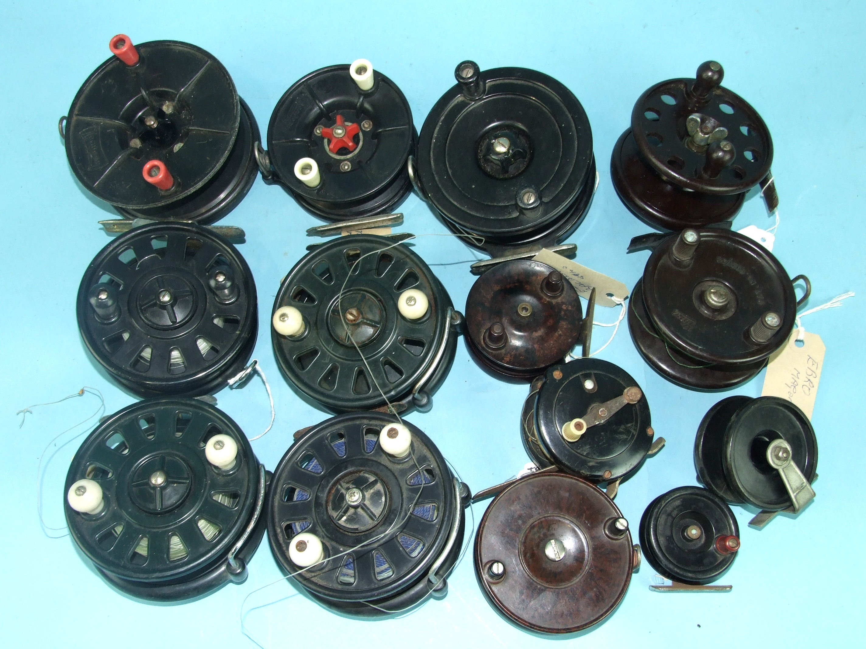 Two Australian Academy Bakelite reels, an Ebro Major 4-inch Bakelite and metal reel, four 5-inch