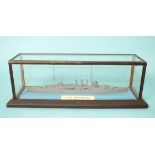 Bassett-Lowke, a 100ft to 1inch waterline model of HMS Devonshire, in glazed wood display case, case