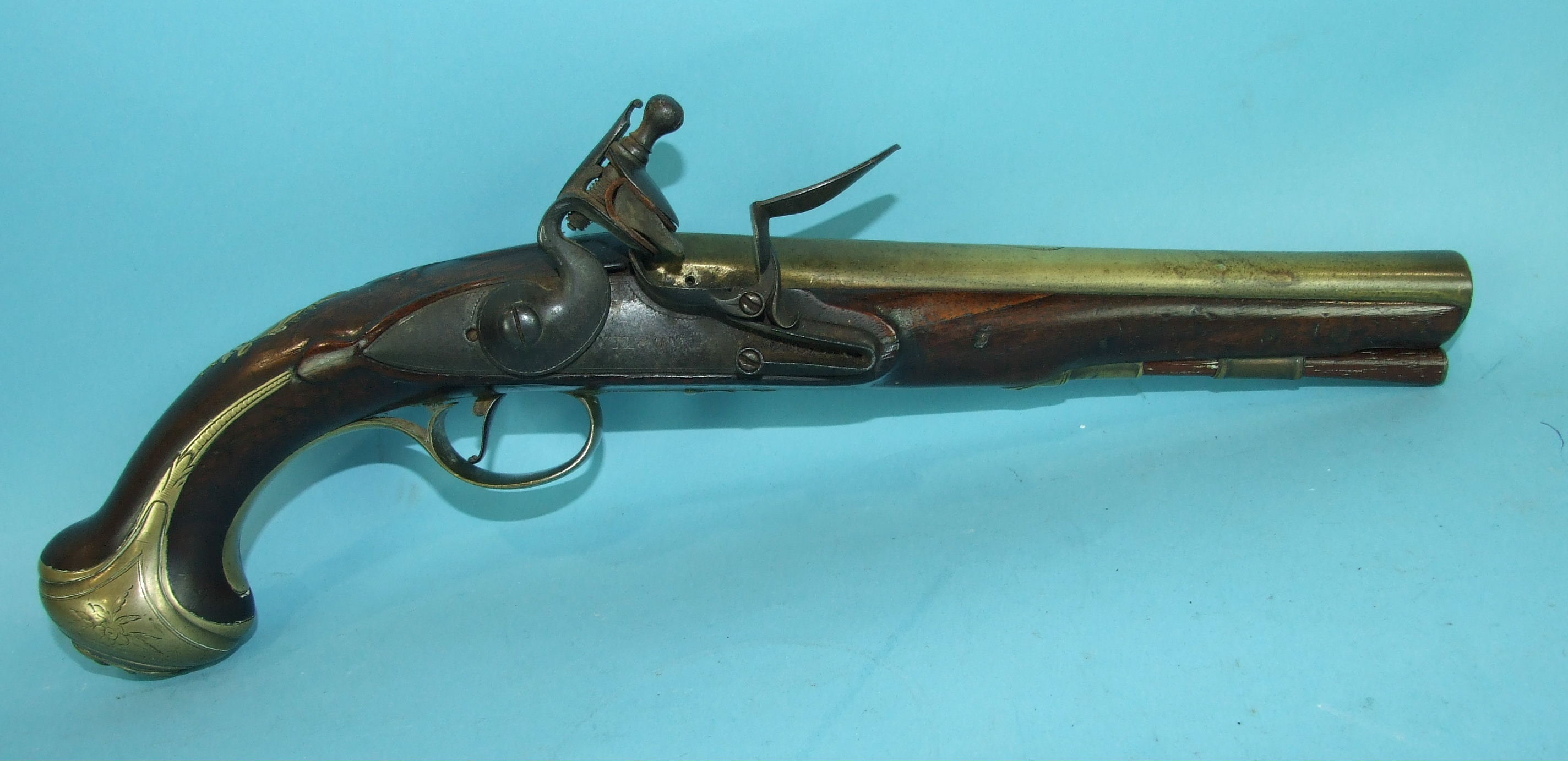 An 18th century flintlock holster pistol by Richard Wilson, London, the 20.5cm brass barrel struck