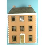 A modern Georgian-style three-storey doll's house, with six rooms and a staircase, 78cm high, 59cm