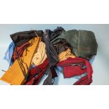 A collection of approximately forty canvas and other rod bags.