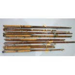 A collection of nine vintage greenheart 7ft and 8ft 2-piece boat rods, with ceramic rings, (9).