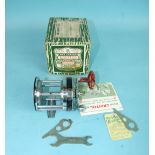 A Pflueger Capitol No.1985 Surf casting reel with spanners and instructions, boxed.