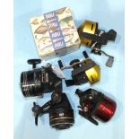 Three Abumatic reels No.s 145, 110 and 80, a Daiwa 9850A, an Abu-Garcia 1044 reel and a Abumatic 315