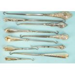 Ten various silver-handled button hooks, (10).