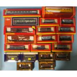 OO Gauge, a quantity of coaches (2) and wagons (18), by Hornby, Dapol and Mainline, all boxed.