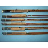 An Everest 9ft split-cane fly rod with two tips, two other 9ft 3-piece split-cane rods with spare