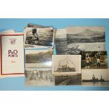 A small quantity of postcards, including an RP of HMS Montagu on the rocks on Lundy Island, an RP of