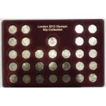 A set of twenty-nine London 2012 Olympic 50p coins, together with a London 2012 coin.