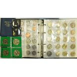 A collection of decimal coins, including seven £5 commemorative crowns, twenty £2 coins, and