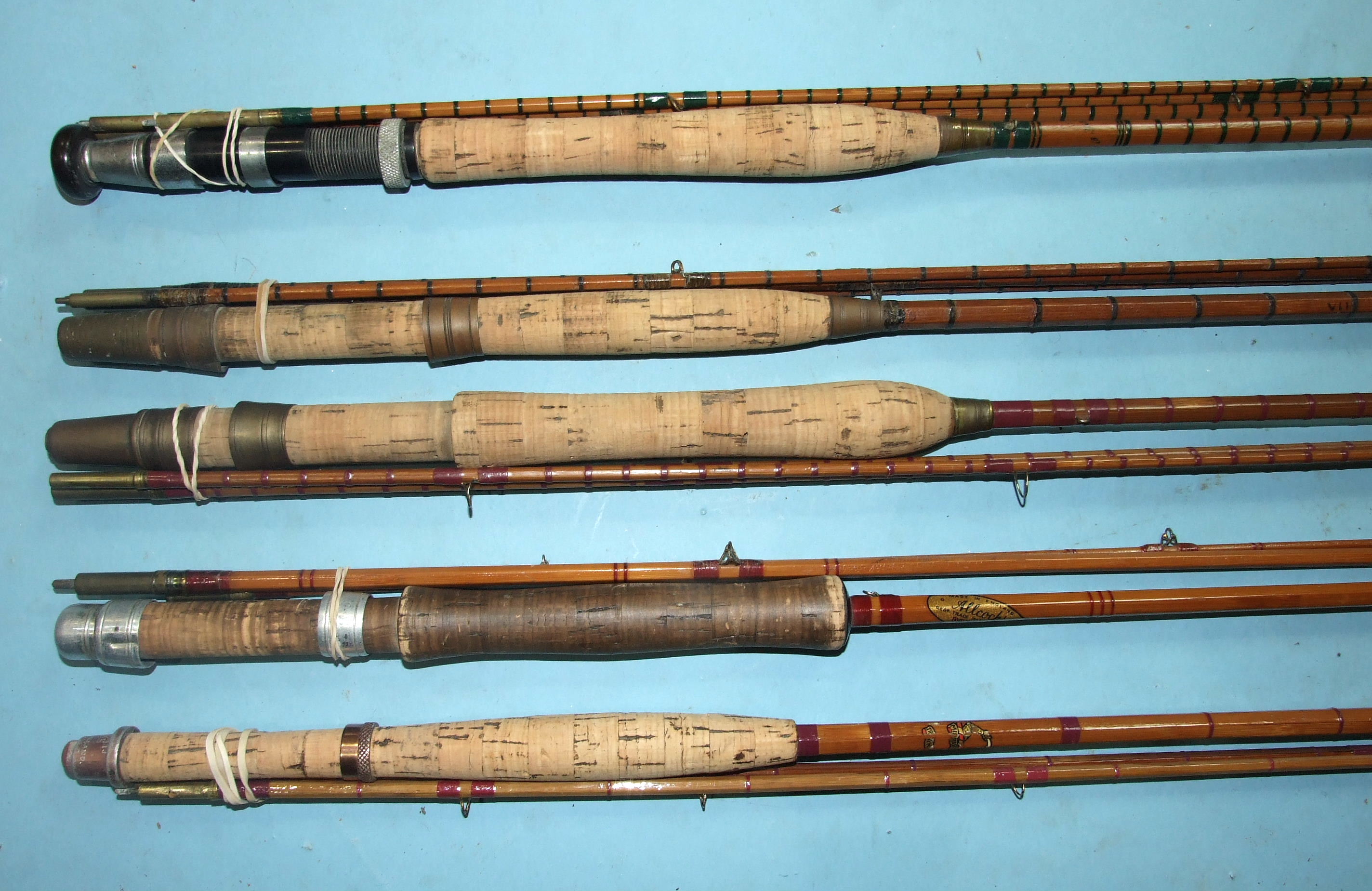 A Milwards 9ft 4-inch split-cane 2-piece fly rod, an Allcocks "Popular" 9ft 3-piece split-cane fly