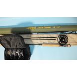 An Airflo delta Classic 11ft #6/7 graphite 3-piece fly rod in bag and tube, together with an