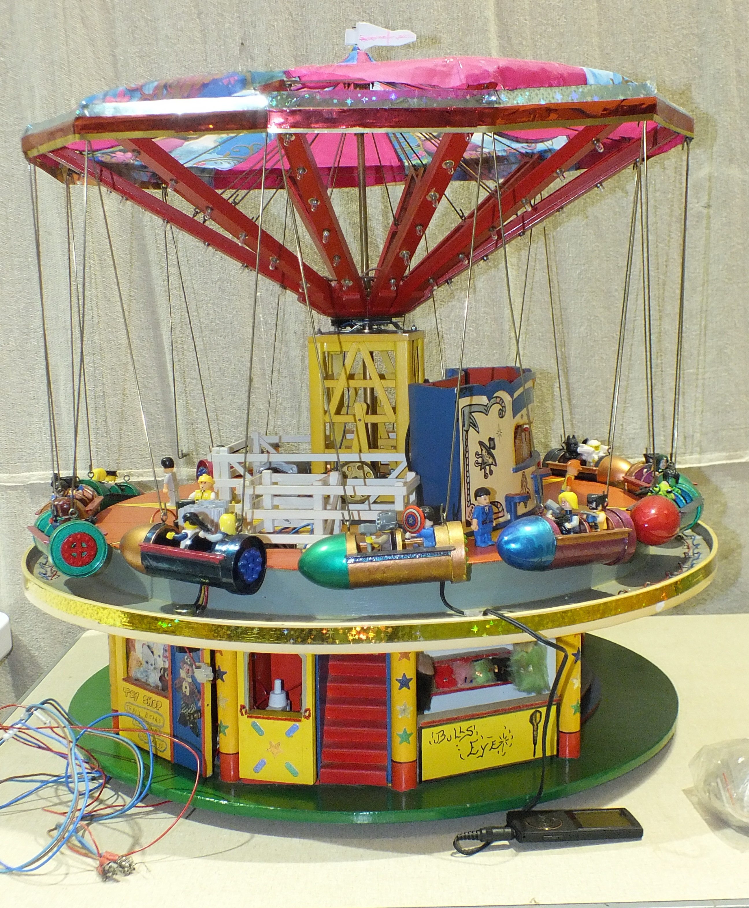 A large scratch-built two-tier Wurlitzer/roundabout, battery-powered with lights and sound, 63cm