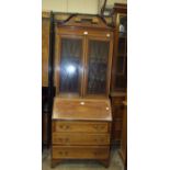 An inlaid cross-banded small mahogany bureau/bookcase, 76cm wide, 202cm high.