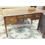 A mahogany knee-hole dressing table fitted with three drawers, on square tapering legs, 126cm wide.