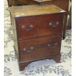 An oak chest of two drawers, on bracket feet, 60cm wide, 74cm high, (converted commode).