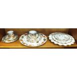 Three graduated Royal Crown Derby plates in the 'Royal Antoinette' 1225 pattern, (seconds) and other
