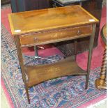 A reproduction mahogany side table fitted with a single drawer, on tapered legs and undertier,