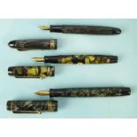 An unmarked fountain pen with green marble-effect barrel and cap, the clip marked Delux 51, the