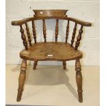 An elm 'captain's' chair.