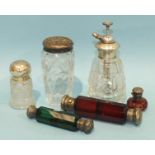 A double-ended green glass scent bottle with white metal mounts, a silver-mounted glass atomiser and