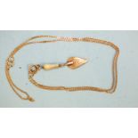 A miniature trowel pendant on a 9ct gold curb-link chain, (chain 2.2g).