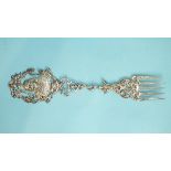 A 19th century Dutch toasting fork, the pierced handle with garlands, cherubs and a bust of