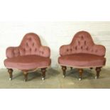 A pair of Victorian walnut upholstered corner chairs with button backs and serpentine seats, on
