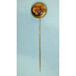 A Victorian stick pin with circular enamel plaque painted with a fox head, in plain gold mount,