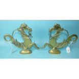 A pair of cast brass gondola finials in the form of sea horses, 23.5cm high, 27cm long, (2).