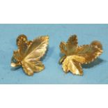 A pair of 9ct yellow gold earrings in the form of maple leaves, with screw fittings, 3.5g, 2 x 1.