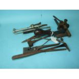 A vintage George Barnsley Saddlers/Cobblers leather plough gauge and other leather-work tools.