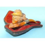 A small carved meerschaum pipe in the form of a woman's head wearing a plumed hat, with silver-