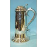 A George II wine flagon of plain tapered cylinder form, with stepped domed hinged lid and