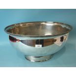 A large oval plated meat cover with beaded rim, converted as a punch bowl, 51 x 40cm, 26cm high.