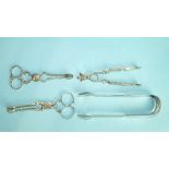 A pair of late-19th century sugar nips, maker RFM, Sheffield 1899, another similar pair, a pair of