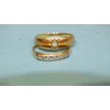 An 18ct gold ring set seven diamond points, size M½, 1.7g and an unmarked ring with vacant