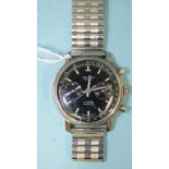 Oriosa, a gentleman's c1960's chronograph wrist watch, the black dial with outer tachymeter scale,