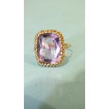 A large amethyst ring with 9ct gold shank, (split), size Q, 6.4g.