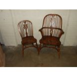 A set of six elm stick-back dining chairs, including two Windsor armchairs, each with solid seat, on